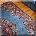 DR02. Oriental Sarouk blue ground rug. Measures approx. 6'4" x 10' 